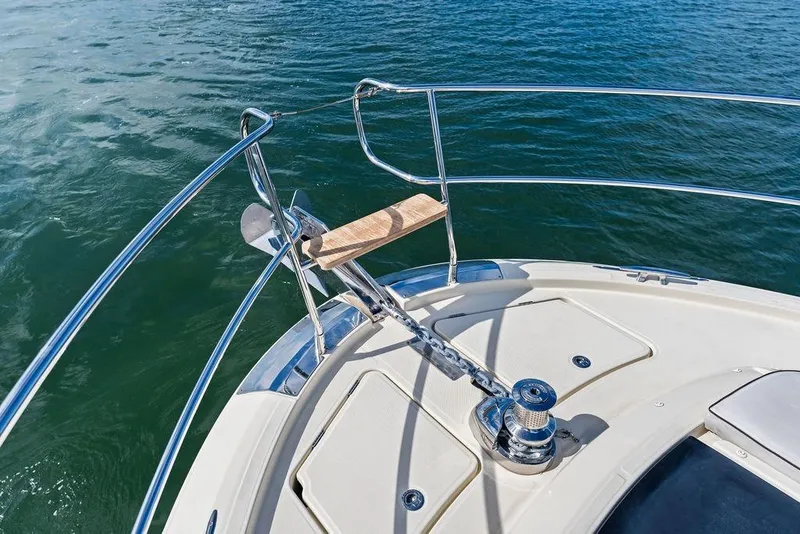 Slide: The Image of Bow of 2018 Monte Carlo MC 35 yacht with anchor and railing on water. - 56