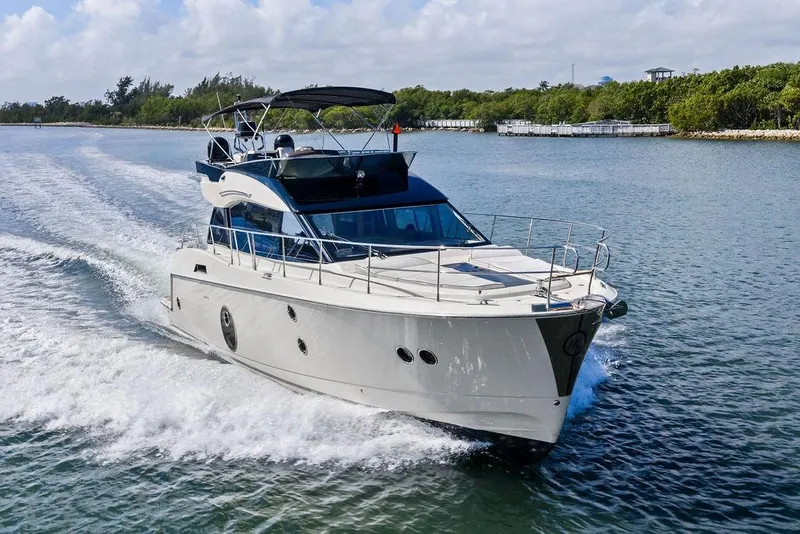 Slide: The Image of Luxury Monte Carlo MC 35 yacht cruising on a sunny day, 2018 model. - 6