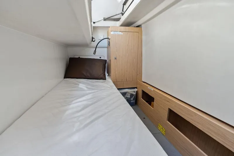 Slide: The Image of Compact cabin interior of 2018 Monte Carlo MC 35 yacht with bed and storage. - 61