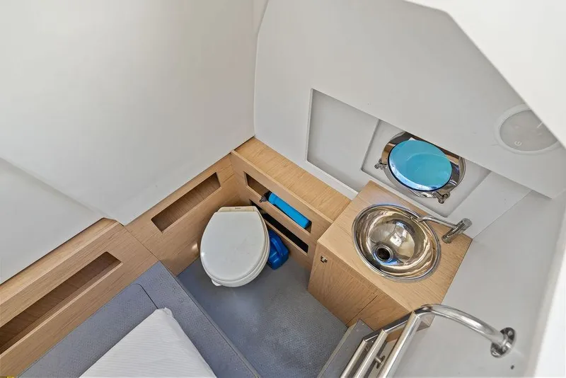 Slide: The Image of Compact bathroom in 2018 Monte Carlo MC 35 yacht with toilet and sink. - 62