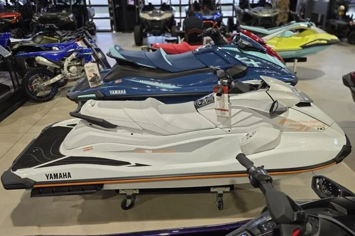 Slide: The Image of 2026 Yamaha WaveRunner GP HO jet ski displayed in a showroom. - 7