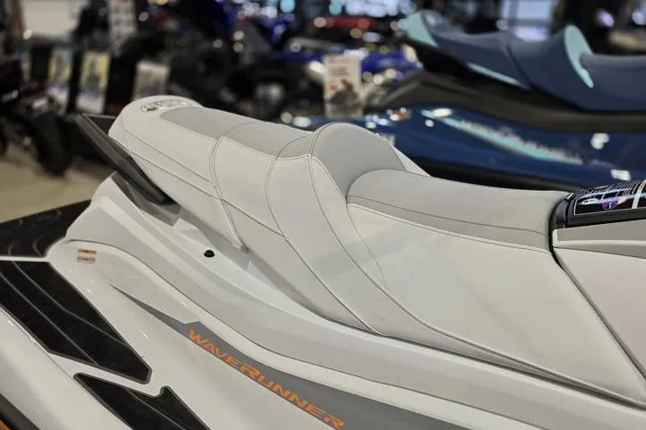 Slide: The Image of 2026 Yamaha WaveRunner GP HO with sleek white seating in showroom. - 9