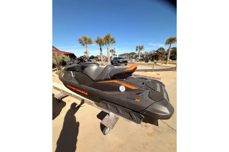 Slide: The Image of 2024 Sea-Doo GTR-X 300 jet ski on display, sunny outdoor setting. - 3