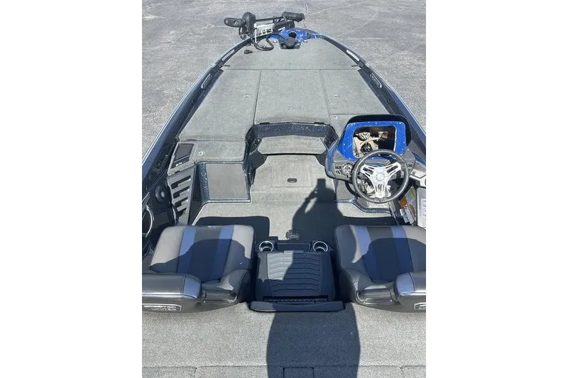 Slide: The Image of 2020 Skeeter FXR21 boat interior with steering wheel and seating. - 3
