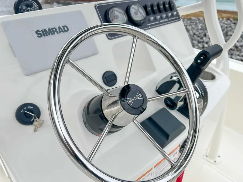 Slide: The Image of Boston Whaler 190 Montauk 2025 helm with Simrad technology. - 11
