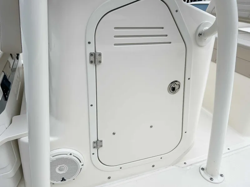 Slide: The Image of 2025 Boston Whaler 190 Montauk boat door and speaker. - 22