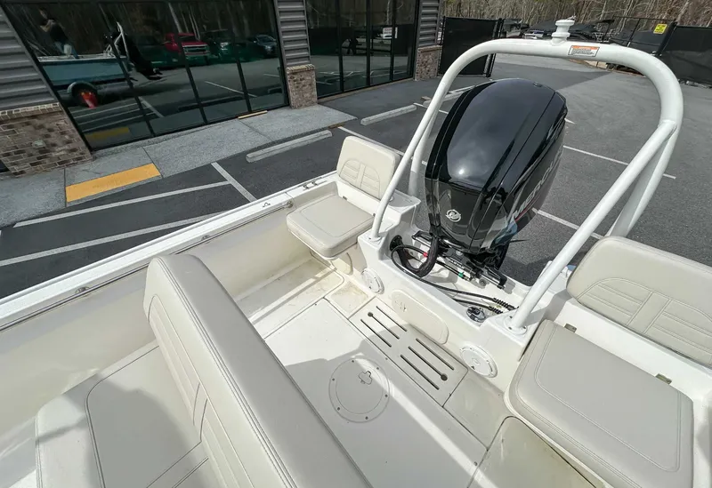 Slide: The Image of Interior view of 2025 Boston Whaler 170 Montauk with engine. - 17