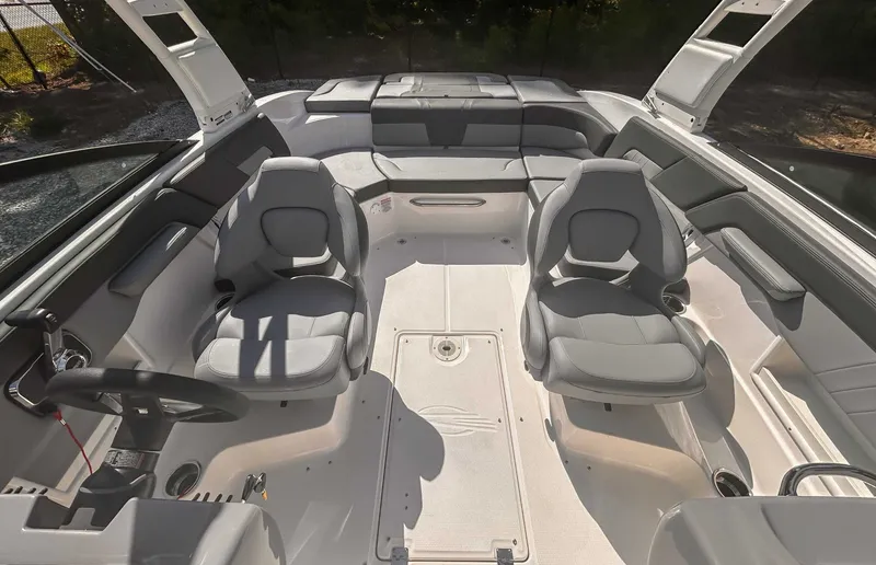 Slide: The Image of Interior of 2026 Chaparral 23 SSi with gray seating. - 11