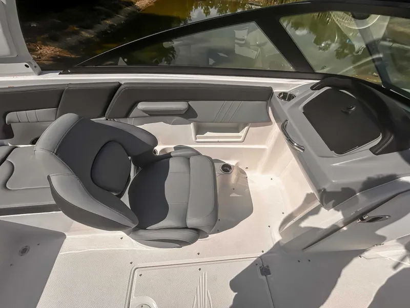 Slide: The Image of Interior of 2026 Chaparral 23 SSi with gray seating. - 12