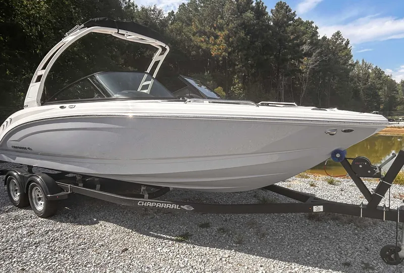 Slide: The Image of 2026 Chaparral 23 SSi boat on trailer outdoors. - 3