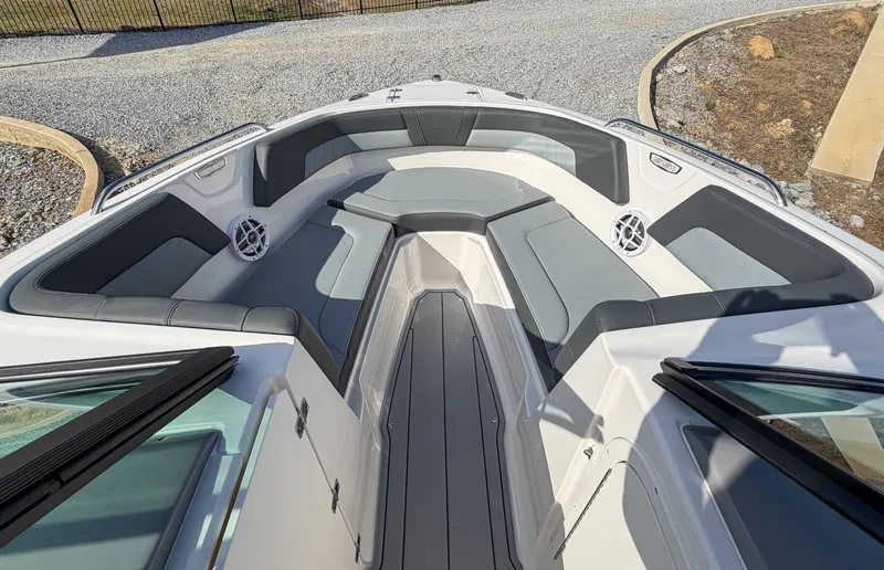Slide: The Image of 2026 Chaparral 23 SSi interior with gray seating. - 10