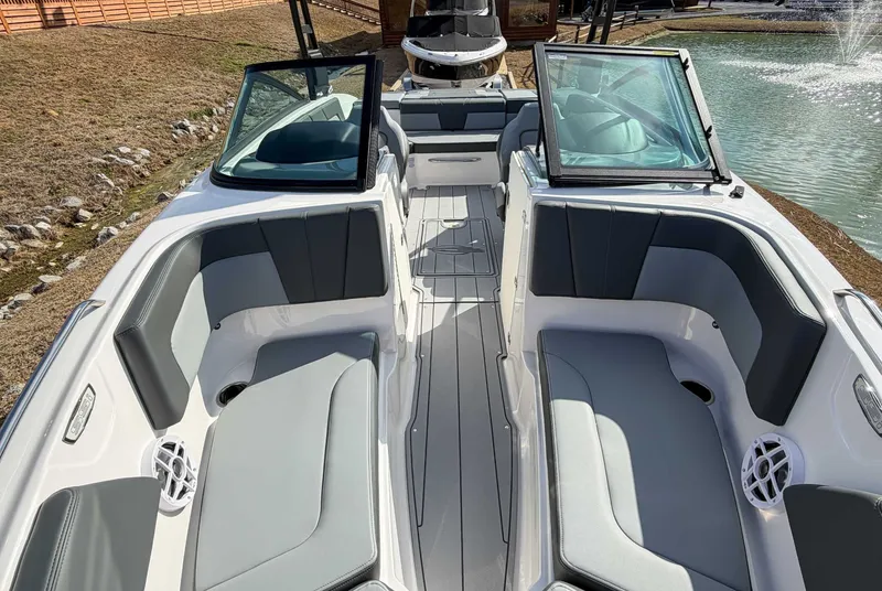 Slide: The Image of Interior of 2026 Chaparral 23 SSi with gray seating. - 11