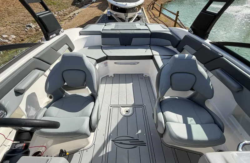 Slide: The Image of Interior of 2026 Chaparral 23 SSi with gray seating. - 12