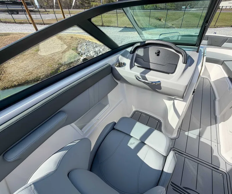 Slide: The Image of Interior of 2026 Chaparral 23 SSi with gray seating. - 13