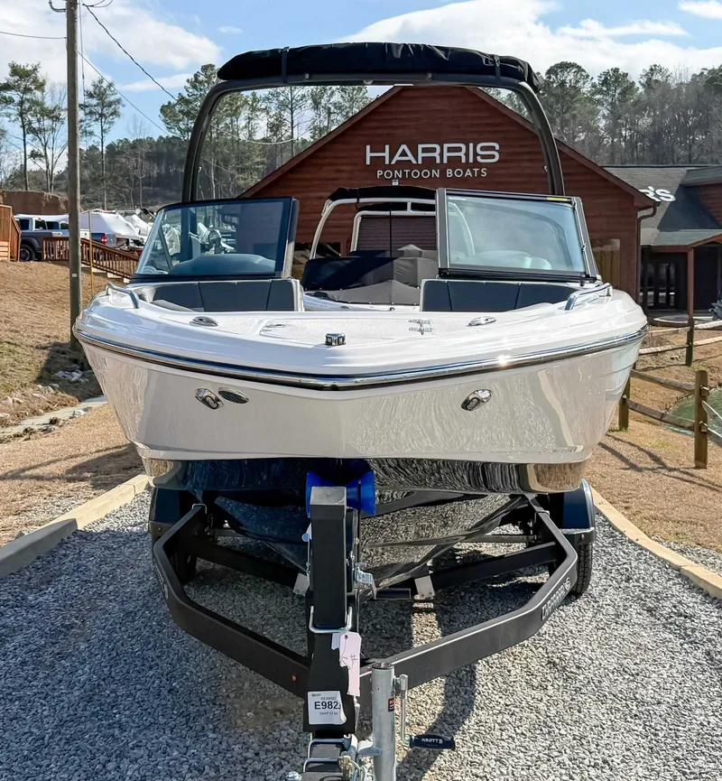 Slide: The Image of 2026 Chaparral 23 SSi boat on trailer at Harris Pontoon Boats. - 4