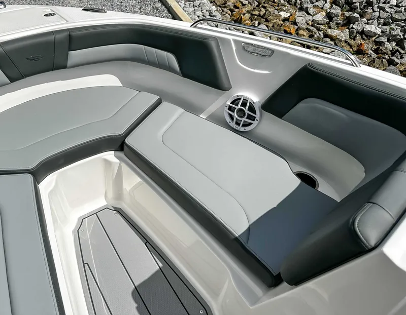 Slide: The Image of 2026 Chaparral 23 SSi interior with gray upholstery. - 16