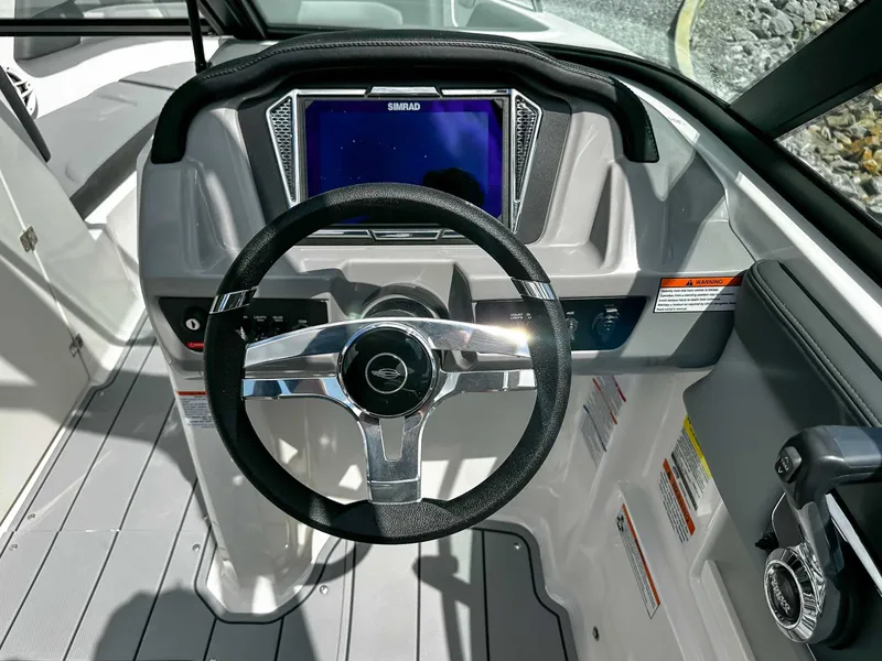 Slide: The Image of Chaparral 23 SSi 2026 helm with Simrad display. - 20