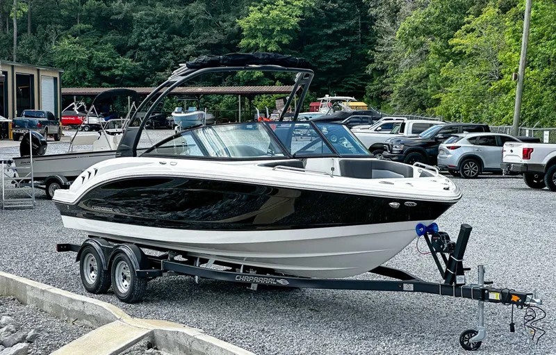 Slide: The Image of 2026 Chaparral 23 SSi boat on trailer parked outdoors. - 5