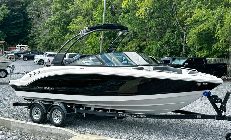Slide: The Image of 2026 Chaparral 23 SSi boat on trailer outdoors. - 6