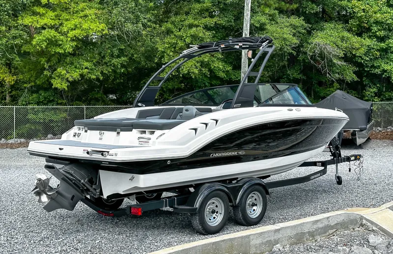 Slide: The Image of 2026 Chaparral 23 SSi boat parked on trailer outdoors. - 8