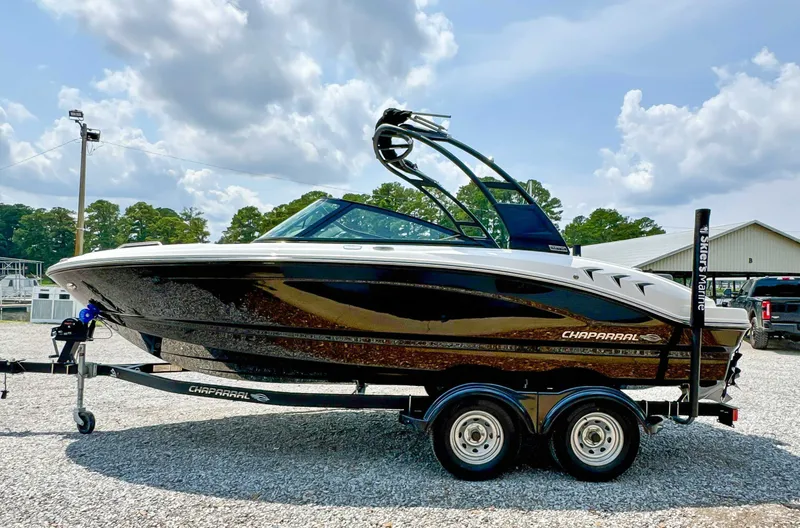 The Image of 2026 Chaparral 21 SSi boat on trailer outdoors. - 1