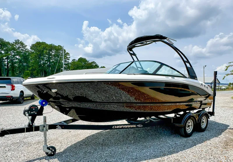 Slide: The Image of 2026 Chaparral 21 SSi boat on trailer, sunny day. - 3
