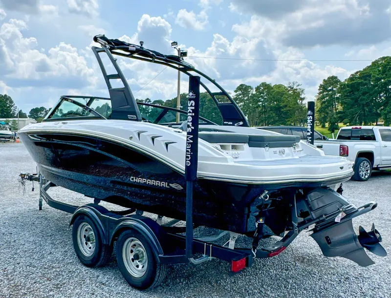 Slide: The Image of 2026 Chaparral 21 SSi boat on trailer, ready for adventure. - 8
