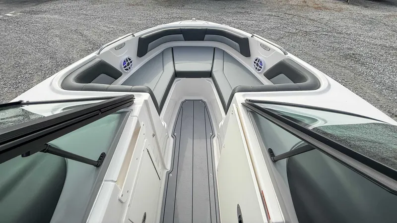 Slide: The Image of Interior view of 2026 Chaparral 21 SSi boat with gray seating. - 14
