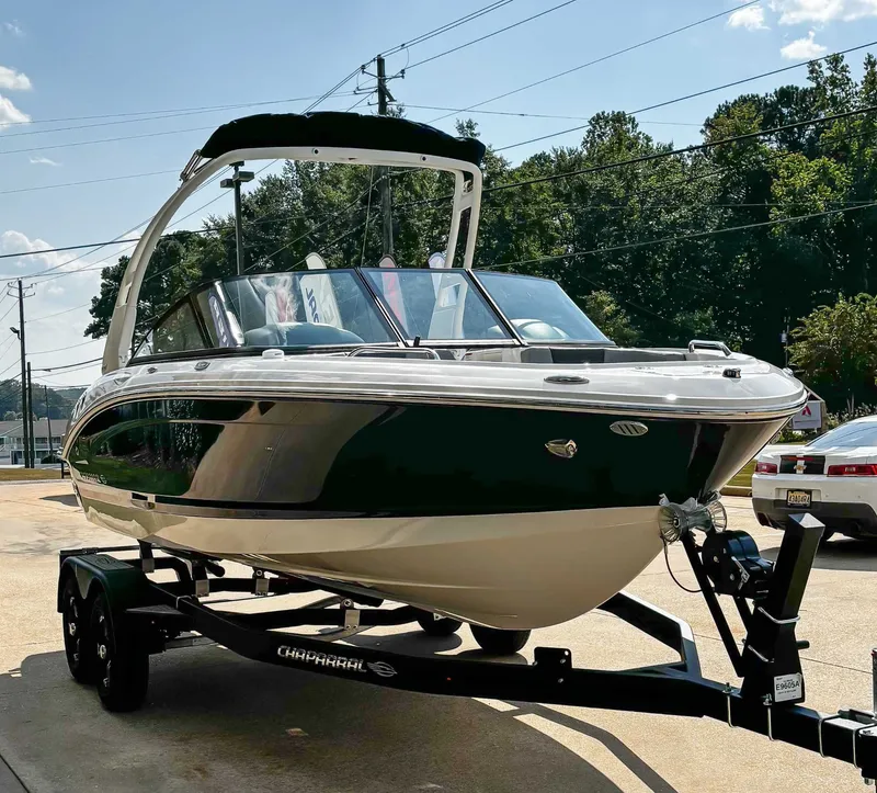 Slide: The Image of 2026 Chaparral GTS 1 boat on trailer, sunny day. - 5
