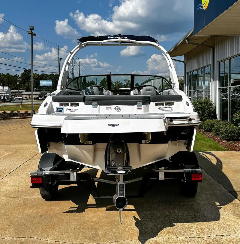 Slide: The Image of Rear view of 2026 Chaparral GTS 1 boat on a trailer. - 9