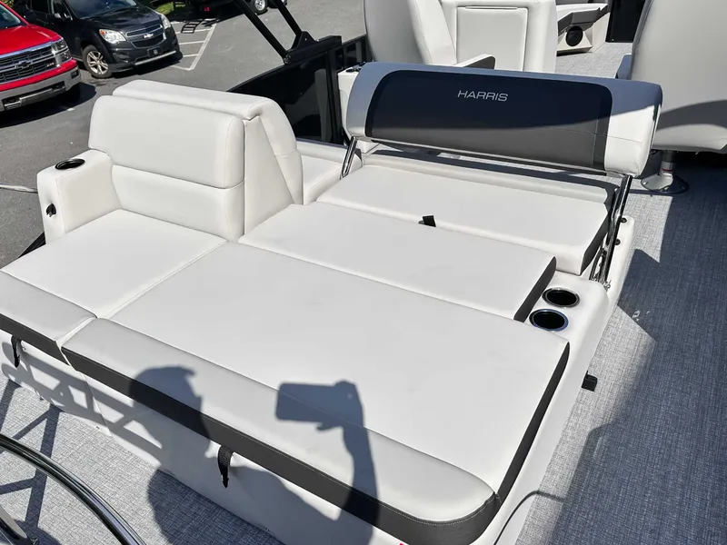 Slide: The Image of 2026 Harris Cruiser 230 SLDH with luxurious white seating. - 11
