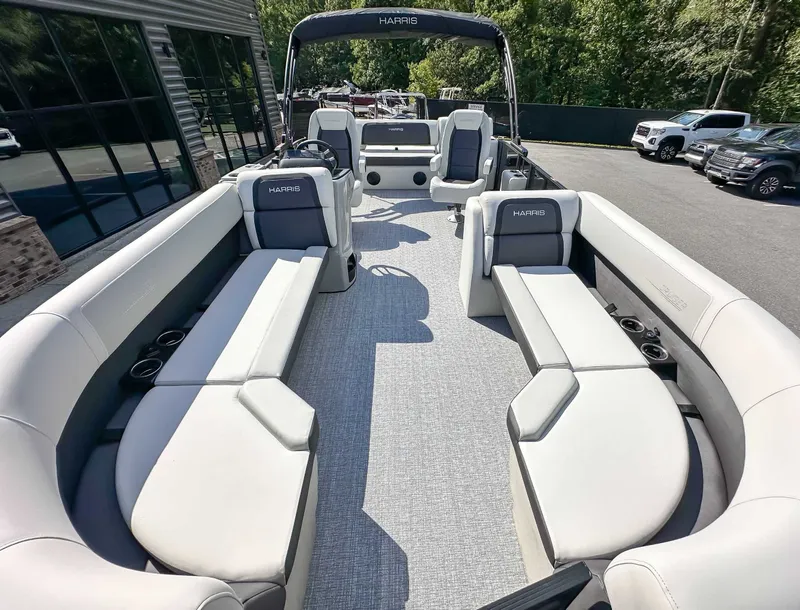 Slide: The Image of Interior of 2026 Harris Cruiser 230 SLDH with luxurious seating. - 16