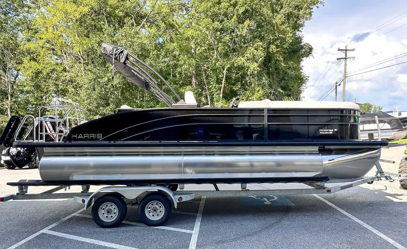Slide: The Image of Harris Cruiser 230 SLDH 2026 parked on trailer outdoors. - 6