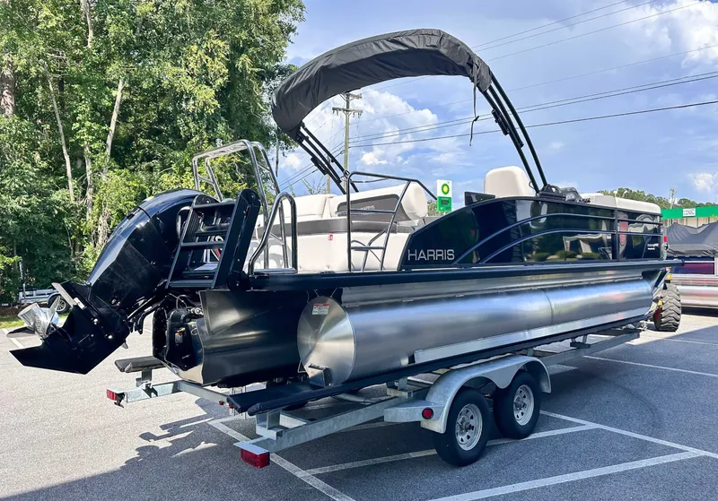 Slide: The Image of Harris Cruiser 230 SLDH 2026 on trailer, parked outdoors. - 7