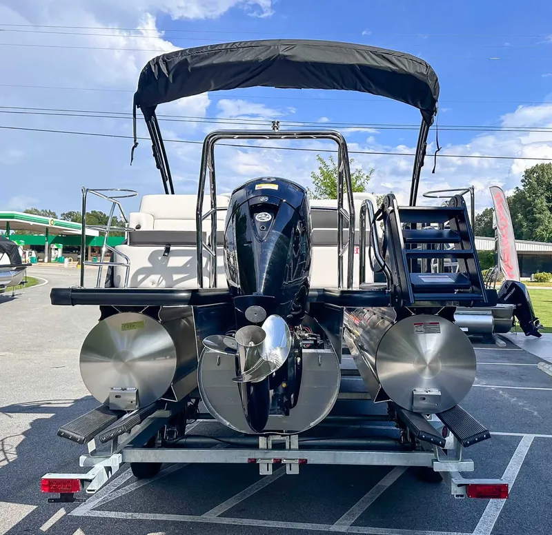 Slide: The Image of 2026 Harris Cruiser 230 SLDH on trailer, rear view with motor. - 9