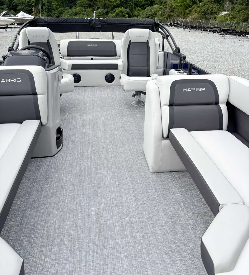 Slide: The Image of Interior of 2026 Harris Cruiser 230 SLDH with luxurious seating. - 12