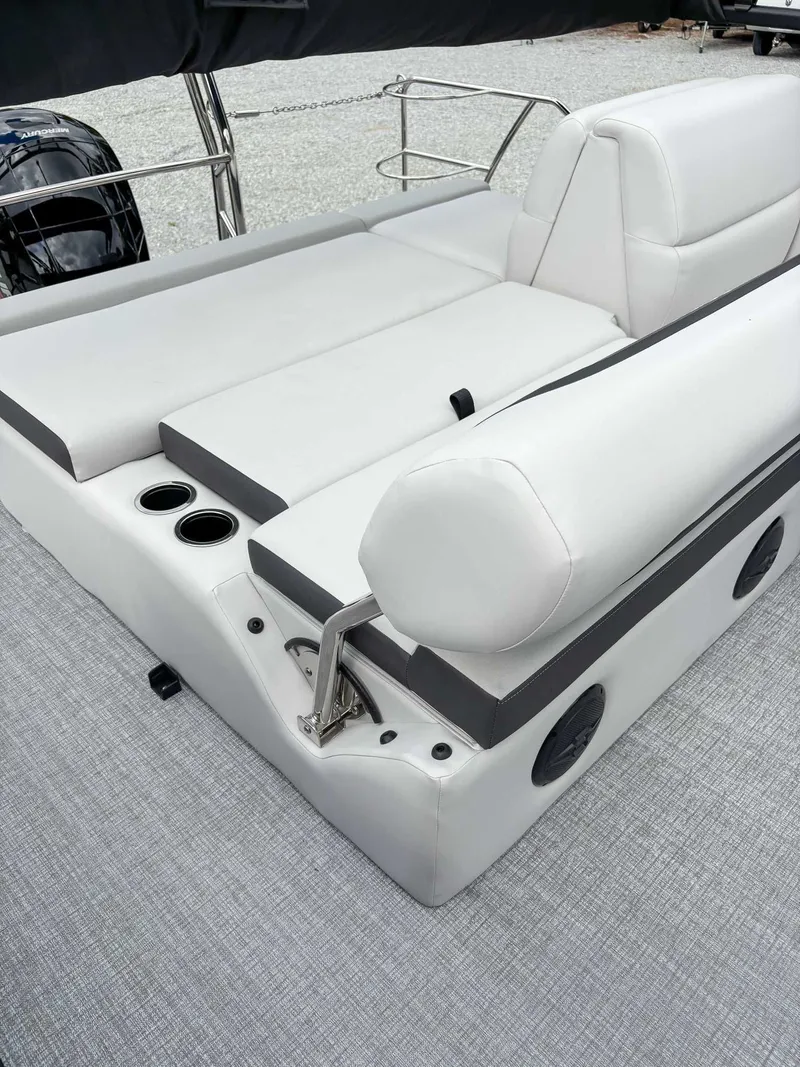 Slide: The Image of Luxurious seating in the 2026 Harris Cruiser 230 SLDH boat. - 19