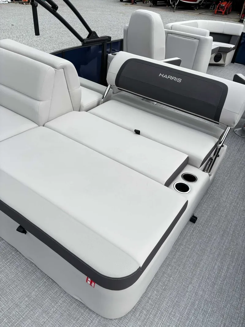 Slide: The Image of Harris Cruiser 230 SLDH 2026, luxurious seating on a boat. - 22