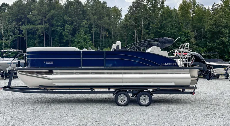 Slide: The Image of 2026 Harris Cruiser 230 SLDH pontoon boat on trailer outdoors. - 5
