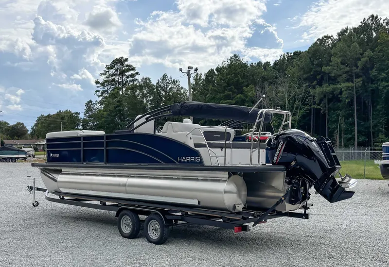 Slide: The Image of 2026 Harris Cruiser 230 SLDH pontoon boat on trailer outdoors. - 6