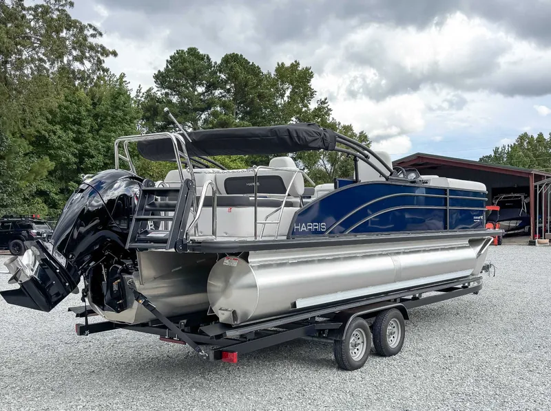 Slide: The Image of 2026 Harris Cruiser 230 SLDH pontoon boat on trailer outdoors. - 7