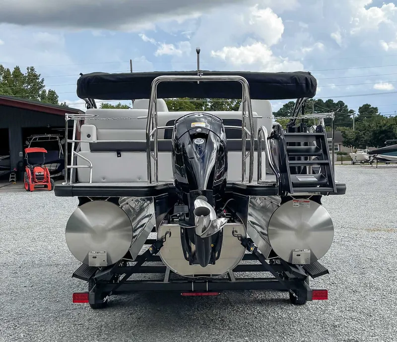 Slide: The Image of 2026 Harris Cruiser 230 SLDH, rear view, on trailer, outboard motor. - 8