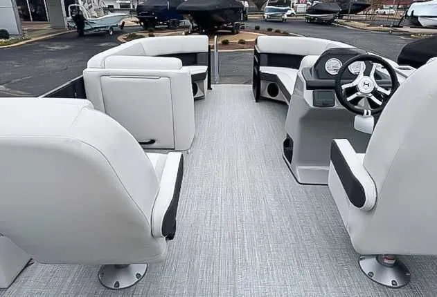 Slide: The Image of Interior of 2026 Harris Cruiser 230 SLDH with luxurious seating. - 7
