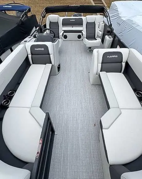 Slide: The Image of Interior of 2026 Harris Cruiser 230 SLDH, luxurious seating and modern design. - 9