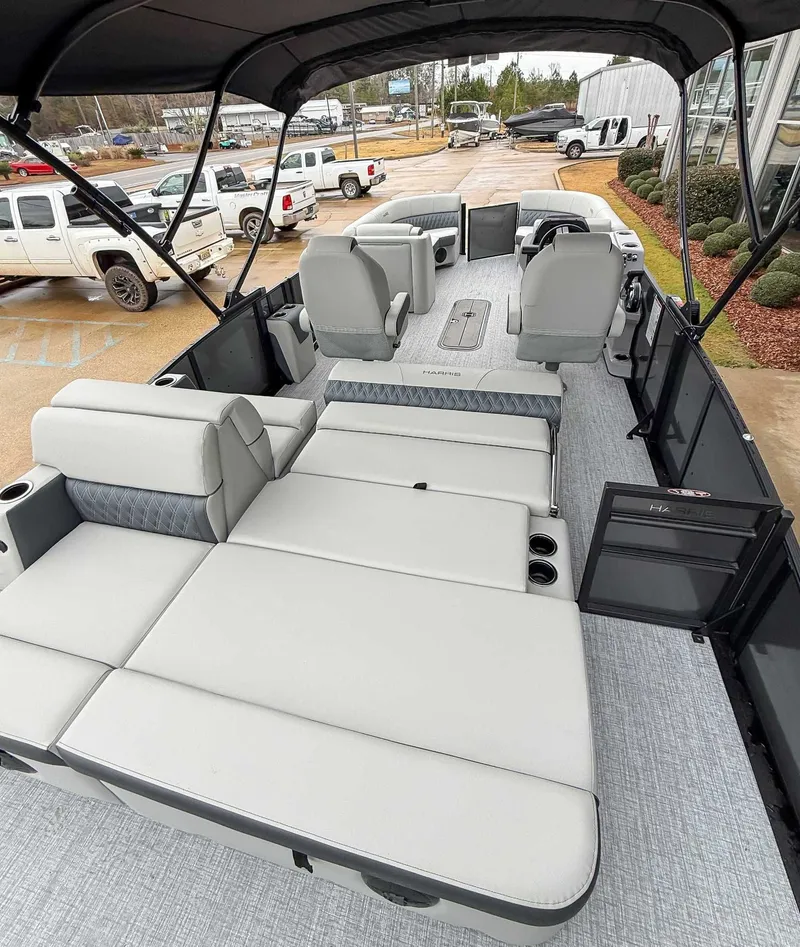 Slide: The Image of Interior of 2026 Harris Cruiser 230 SLDH with luxurious seating. - 10