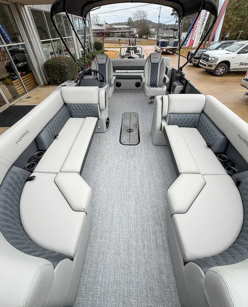 Slide: The Image of Interior of 2026 Harris Cruiser 230 SLDH with luxurious seating. - 12