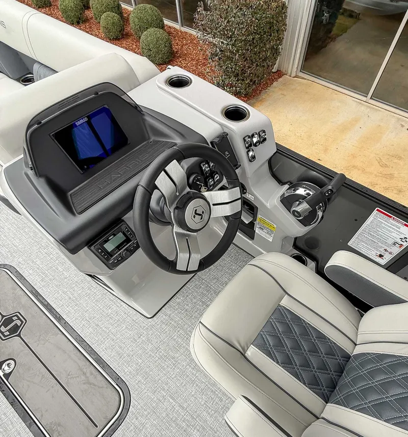 Slide: The Image of Interior view of 2026 Harris Cruiser 230 SLDH helm. - 19
