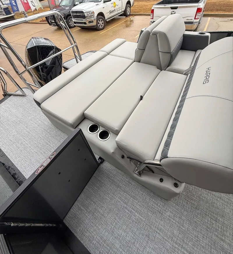 Slide: The Image of 2026 Harris Cruiser 230 SLDH with luxurious lounge seating. - 21