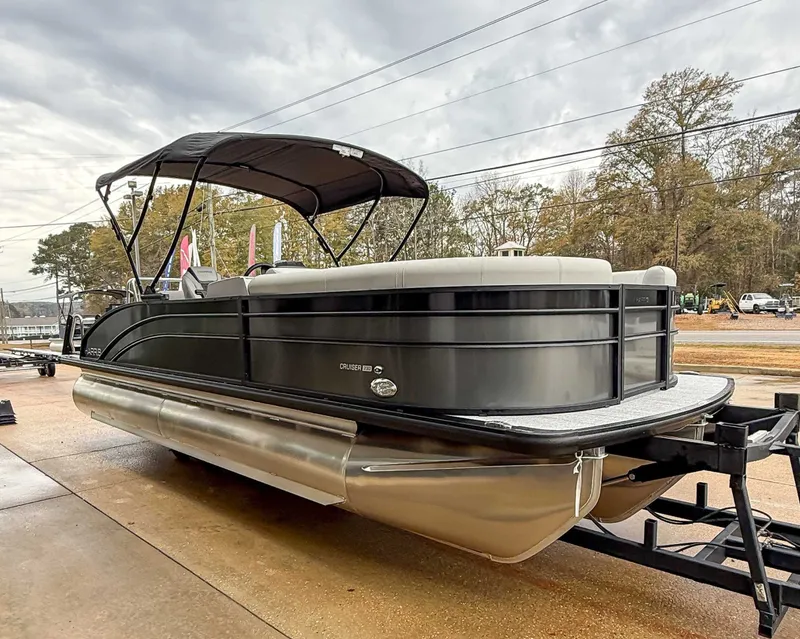 Slide: The Image of 2026 Harris Cruiser 230 SLDH pontoon boat on a trailer. - 5