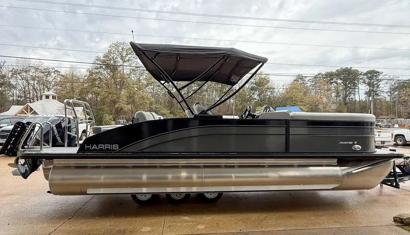 Slide: The Image of 2026 Harris Cruiser 230 SLDH pontoon boat in parking lot. - 6
